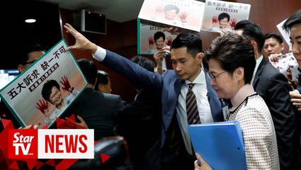 Hong Kong policy address halted after heckling