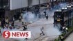 Police fire tear gas in Hong Kong protests condemning proposed security legislation