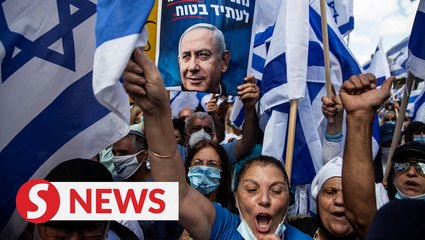 Israel's Netanyahu says he's been framed but will “stand tall”