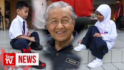 Dr M makes sole decision: Wear shoes of any colour to school