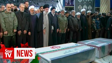 Iranian commander's daughter warns US of 'dark day' at funeral