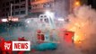 Hong Kong protesters face barrage of tear gas in Wan Chai