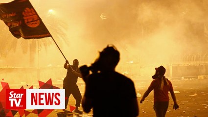 Eight killed, dozens wounded as Iraq protests flare again