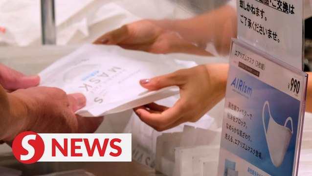 Japan shoppers queue, crash website for Uniqlo's washable masks