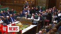 Protesting lawmakers pushed away during UK Parliament suspension