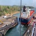 A Series Of Ships Go Through Panama Canal