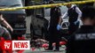 One dead, six injured in suspected suicide bombing at Indonesia police station