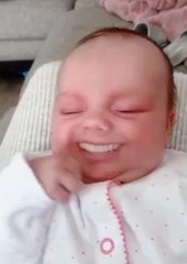 Mom Laughs Out Loud Post Putting Grinning Effect on Baby's Face