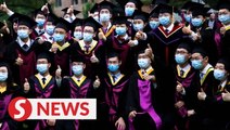 Chinese university holds social distancing-style graduation ceremony