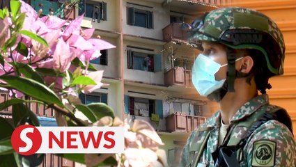 Police: Report received over objects being thrown at security forces at Selangor Mansion