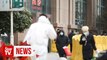 Wuhan combs communities to leave no coronavirus patient unattended