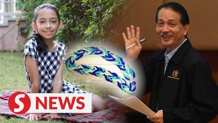 Nine-year-old seals friendship with Dr Noor Hisham with self-loomed bracelet