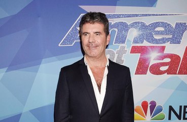 Simon Cowell using healing crystals after bike crash