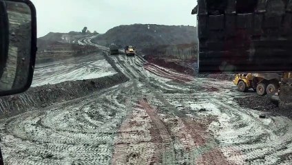 Dump Truck Drifting in to Be Loaded