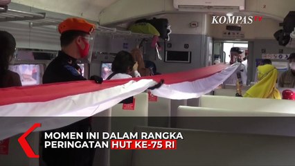Momen Kibarkan Bendera Dalam Gerbong Kereta