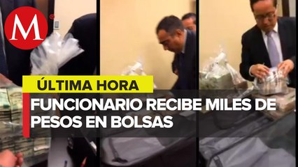 Difunden video de ex funcionarios del Senado recibiendo bolsas de dinero