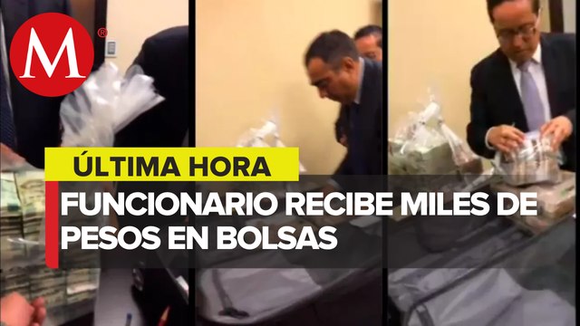 Difunden video de ex funcionarios del Senado recibiendo bolsas de dinero