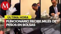 Difunden video de ex funcionarios del Senado recibiendo bolsas de dinero