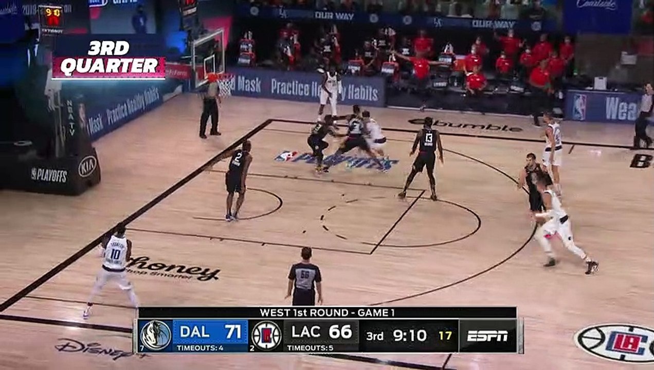 Mavericks' Porzingis ejected after defending Do...