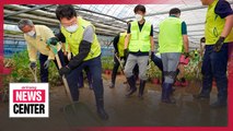 Volunteers in S. Korea help rain-hammered regions recover