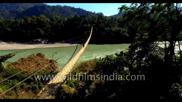 Aerial journey over Hanging bridge on massive Brahmaputra river in north-east India