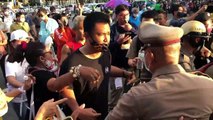 Protesters clash with police as Thai politician pushes through crowds at student rally