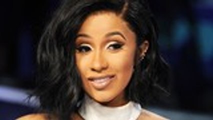 Cardi B Has Pamela Anderson Barb Wire-Inspired Photoshoot | Billboard News