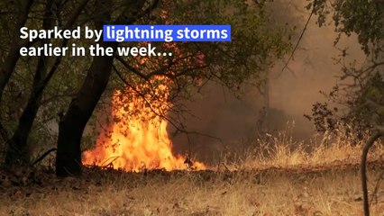 Thousands evacuated as fast-moving fires spread in California