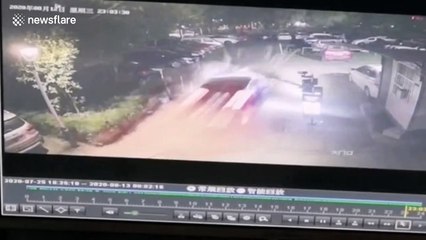 Out-of-control Tesla smashes through parking barrier in China