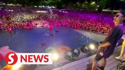 China defends Wuhan's massive pool party