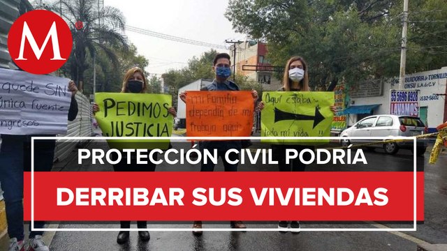 Vecinos exigen reparación de viviendas dañadas por choque de tráiler en Eje Central