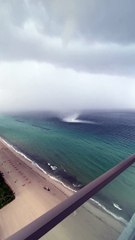 Impressive Tornado Forms Off the Coast