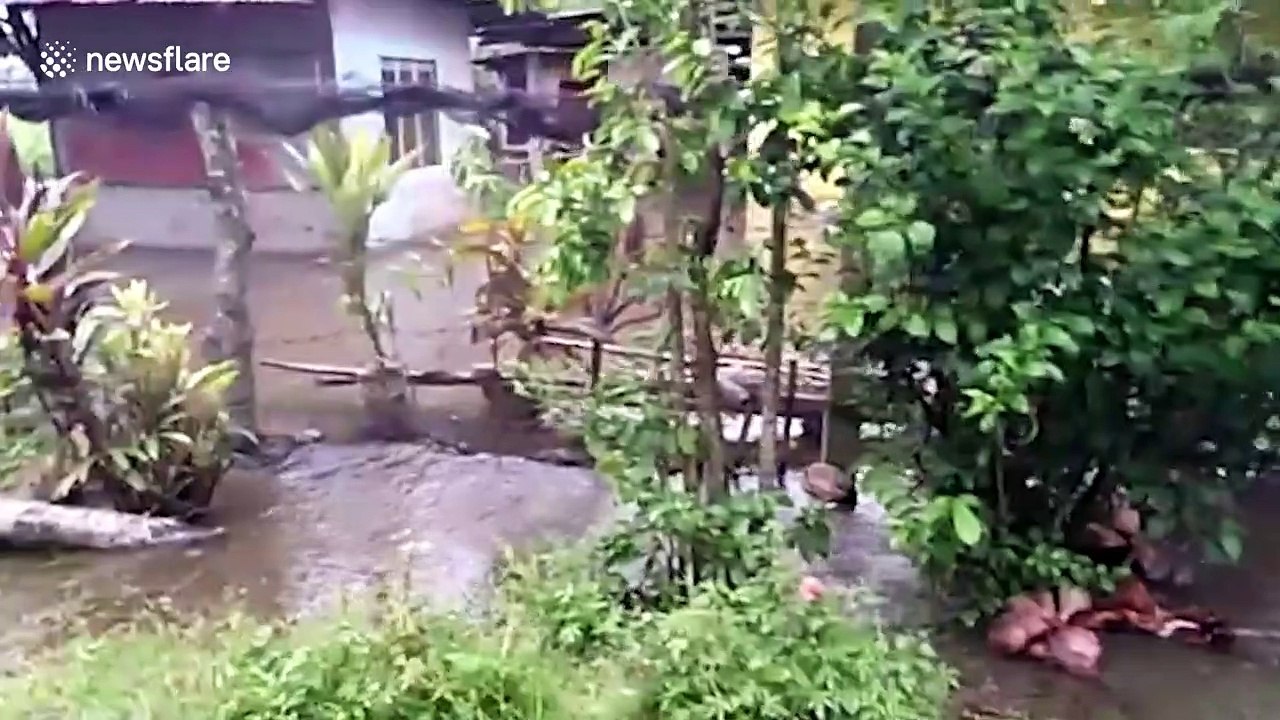 Homes submerged by flash floods in the Philippines