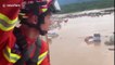 Helicopter used to rescue Chinese residents trapped in flooded village