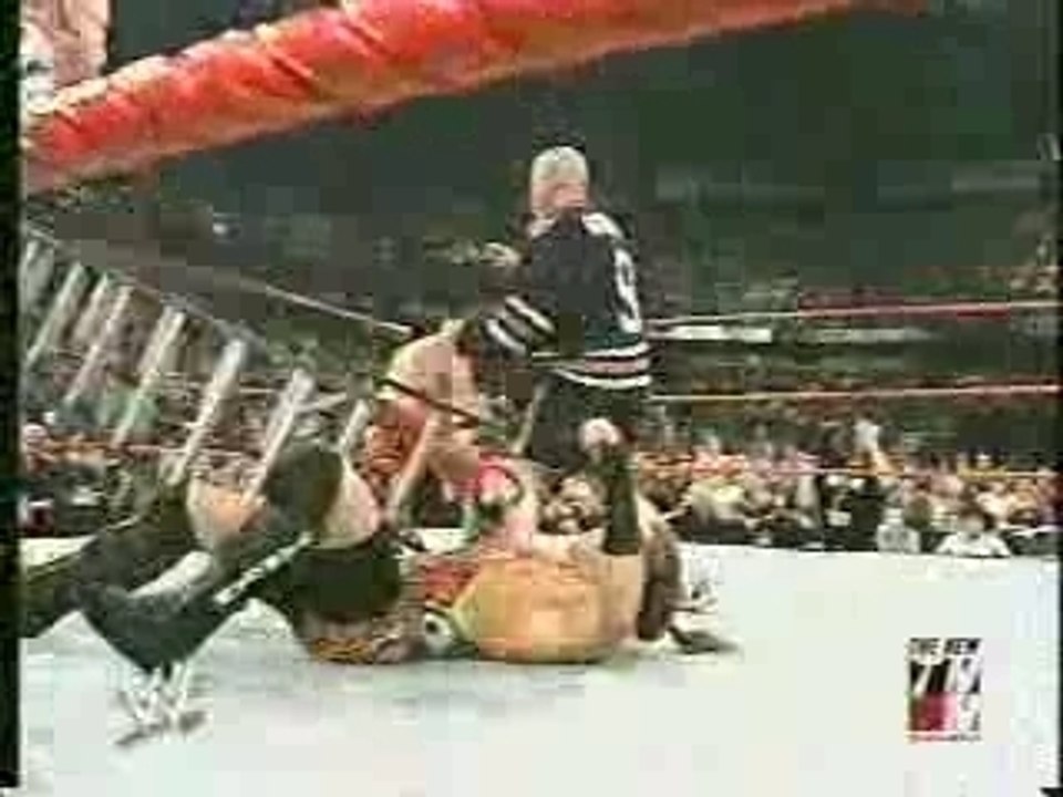 wwe - fan attacks eddie guerrero during his ladder match