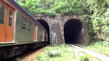 Train passing through tight tunnel hits wall. Scary tunnel