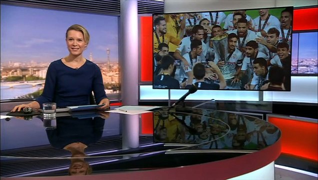 Sevilla fans celebrate after their team wins the Europa League