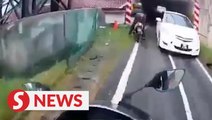 Driver of Toyota Vios on motorcycle lane surrenders to police