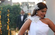 لقطات تبرز تصميم فستان نورهان منصور الأول في حفل زفافها
