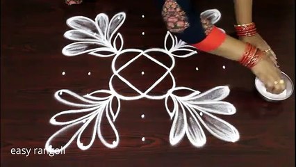 creative muggulu ,rangoli art designs with 7 dots,   latest easy & simple kolam