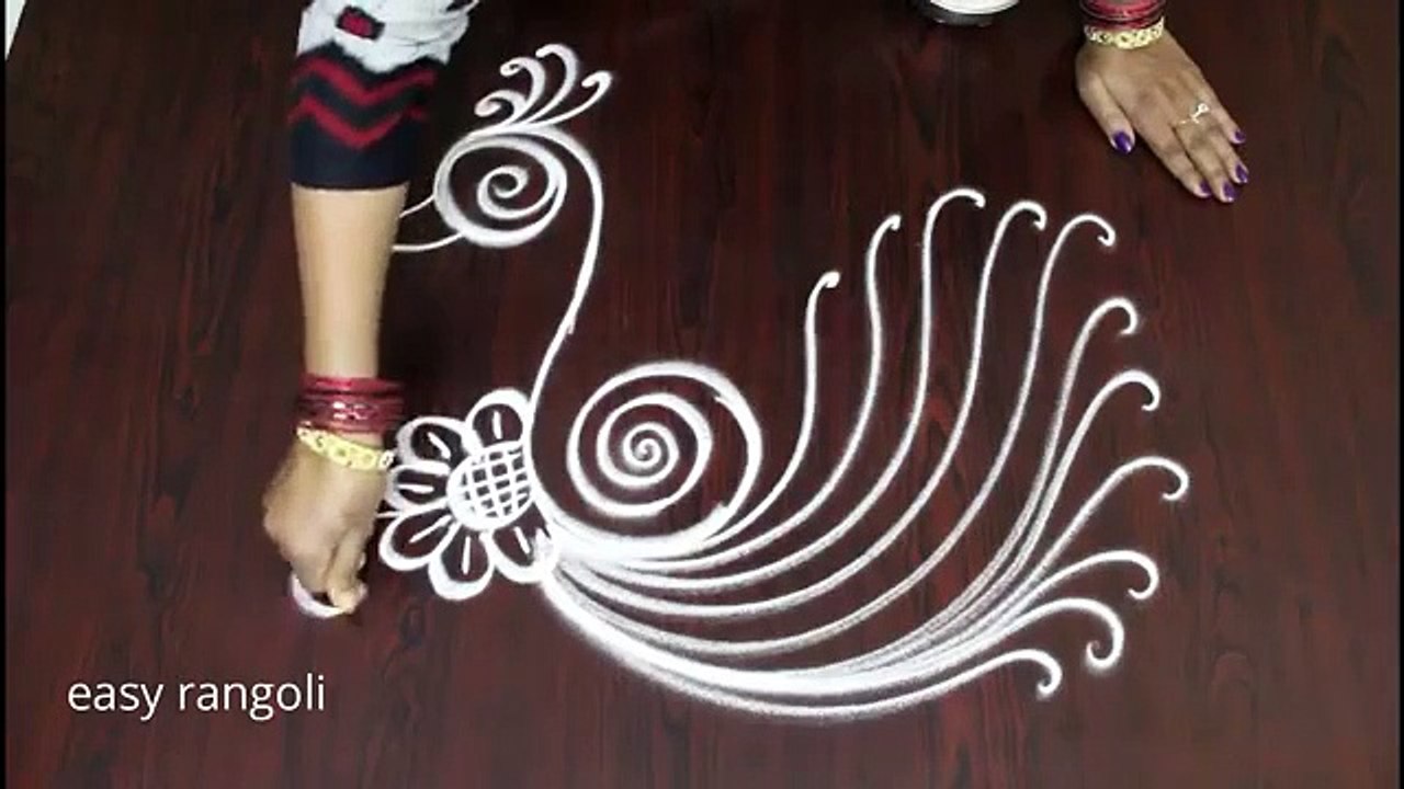 Creative peacock kolam designs,   freehand Peacock muggulu designs,    easy and simple rangoli
