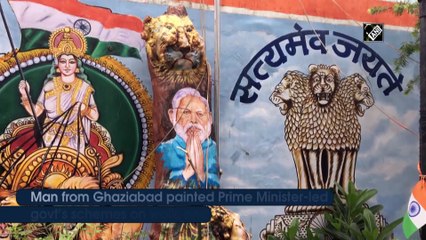 Man paints Modi govt schemes on walls, trees amid lockdown to spread awareness