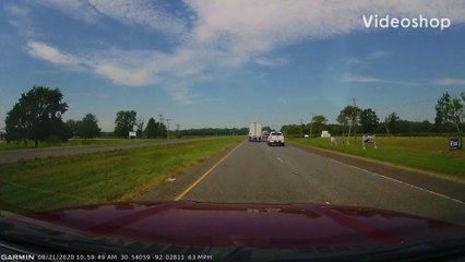 Car Picks the Wrong Time to Turn Across Highway