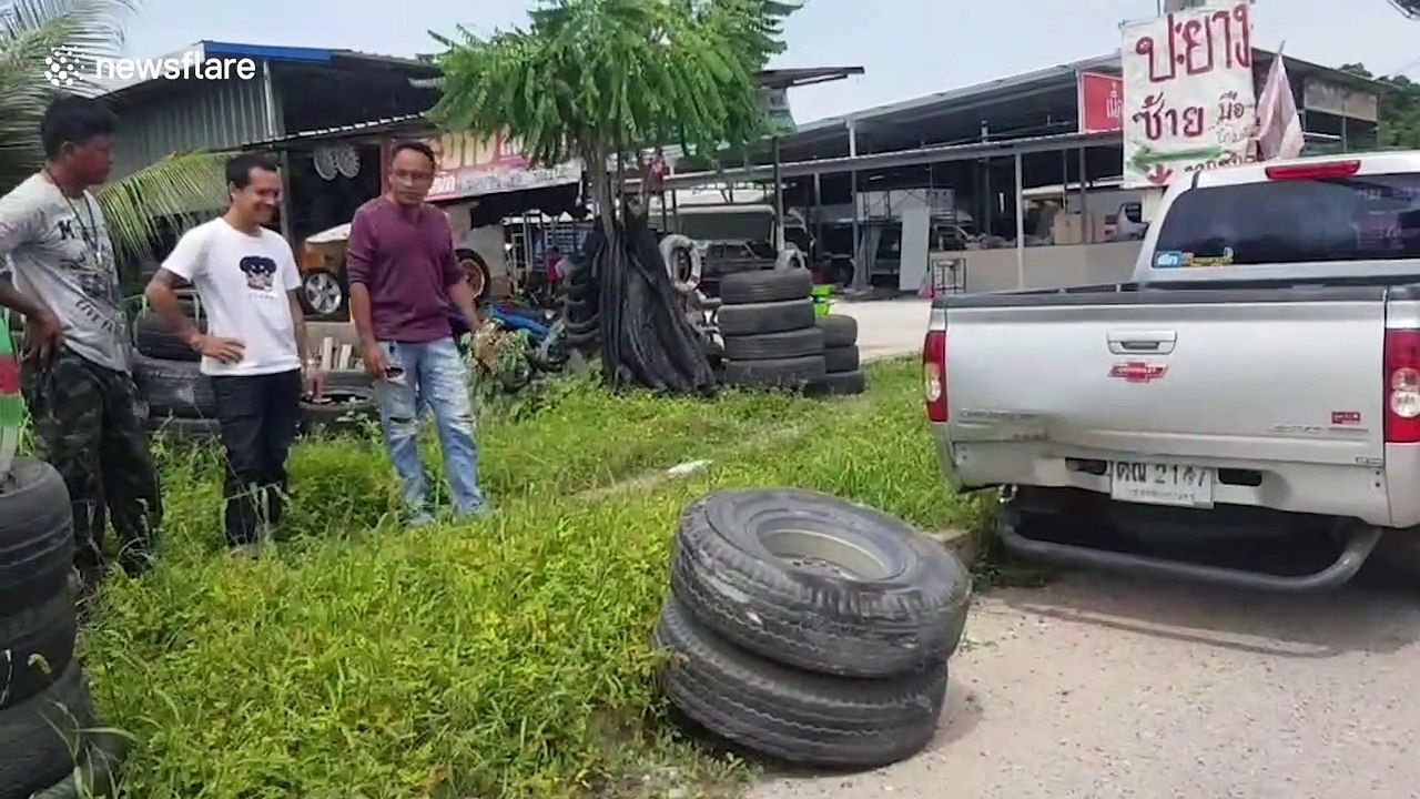 Lorry's wheel flies off after hitting pothole on badly maintained Thai road