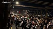 Protesters in New York take over Brooklyn bridge to show solidarity with Kenosha