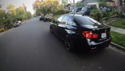 Cyclist Mesmerized by Motorcycle Face Plants Into Parked Car