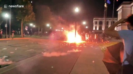 Protesters subject to teargas after launching projectiles outside Kenosha courthouse