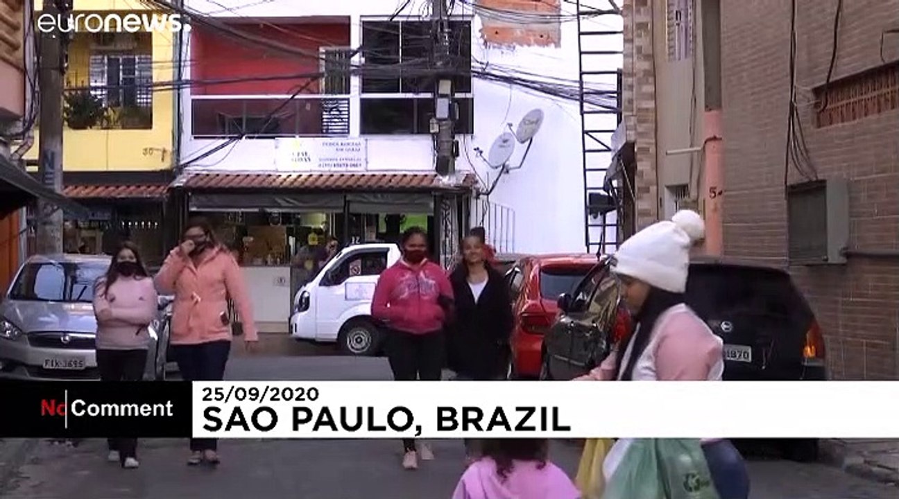 Musicians try to lift spirits in COVID-hit Brazilian favela
