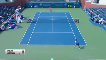 Azarenka battles past Jabeur into semis