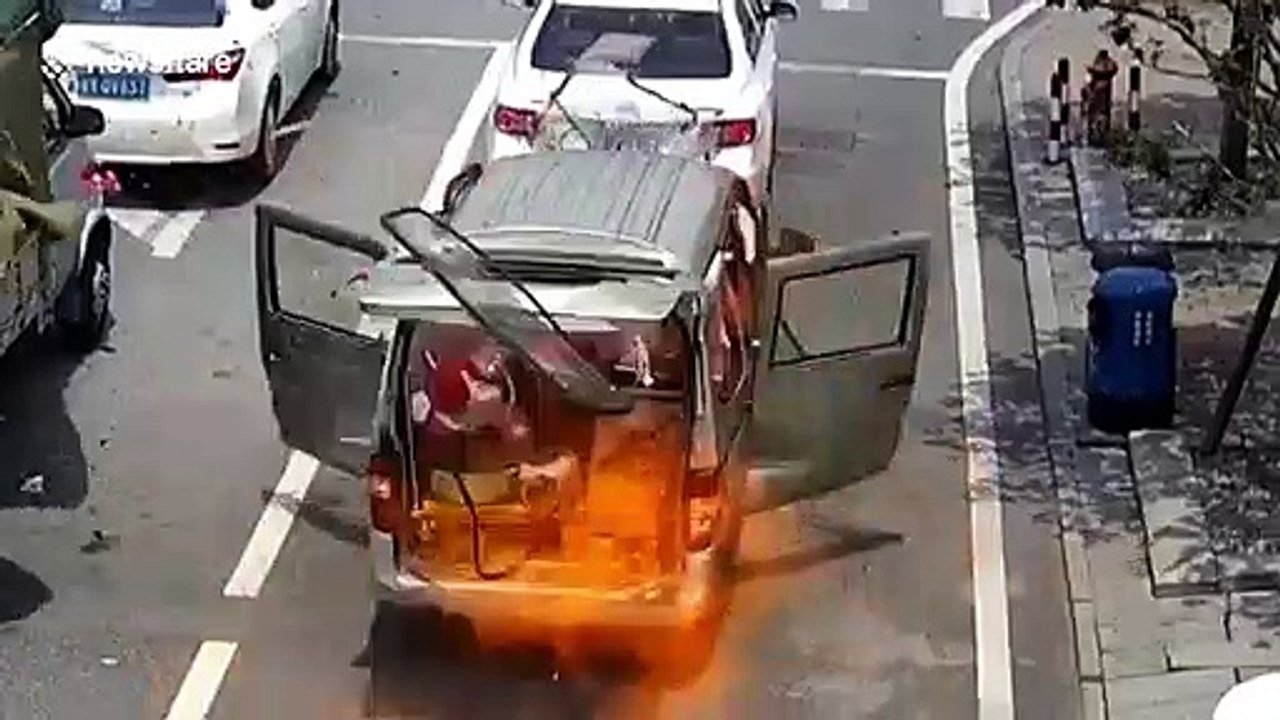 Minibus explodes while waiting at traffic lights in southern China